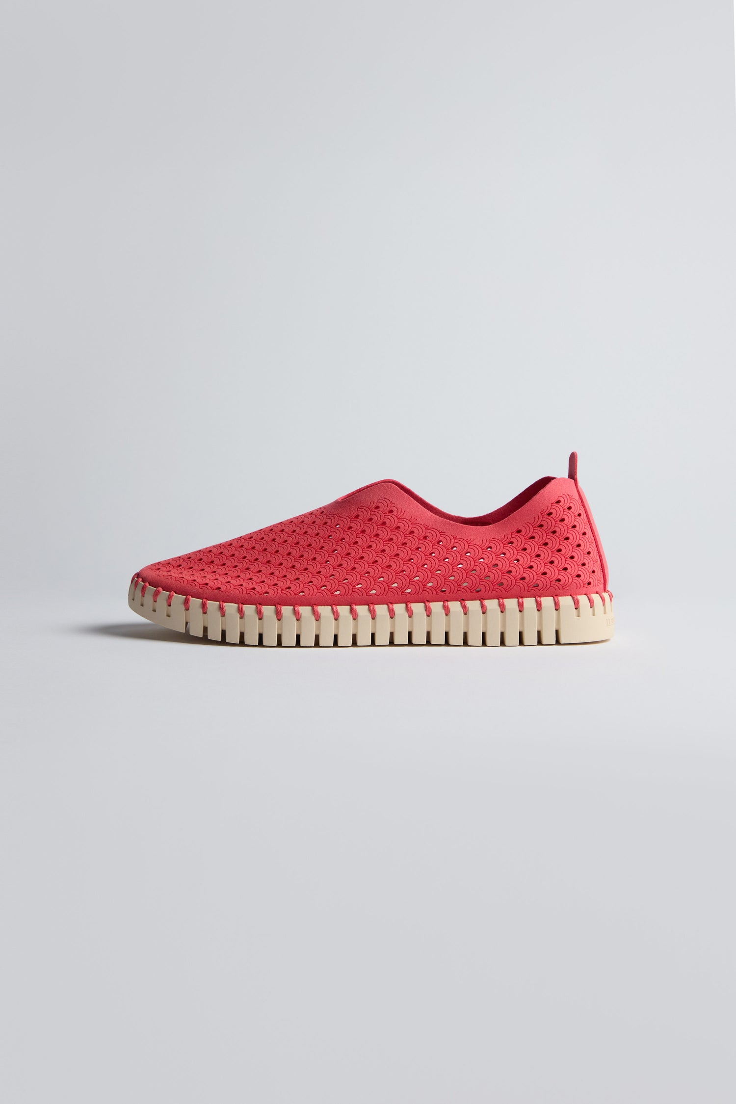 The Raspberry Tulip Platform Slip On Shoes feature a red perforated recycled microfiber upper and a white textured sole, displayed against a plain light background.