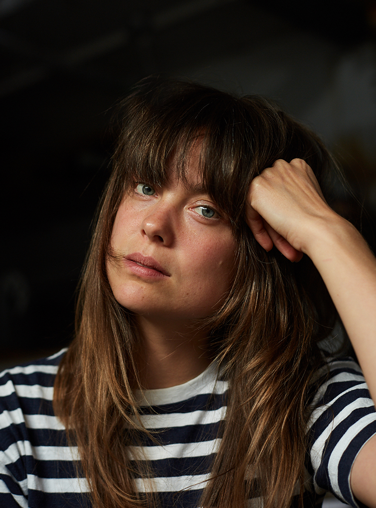 woman in black and white striped t-shirt