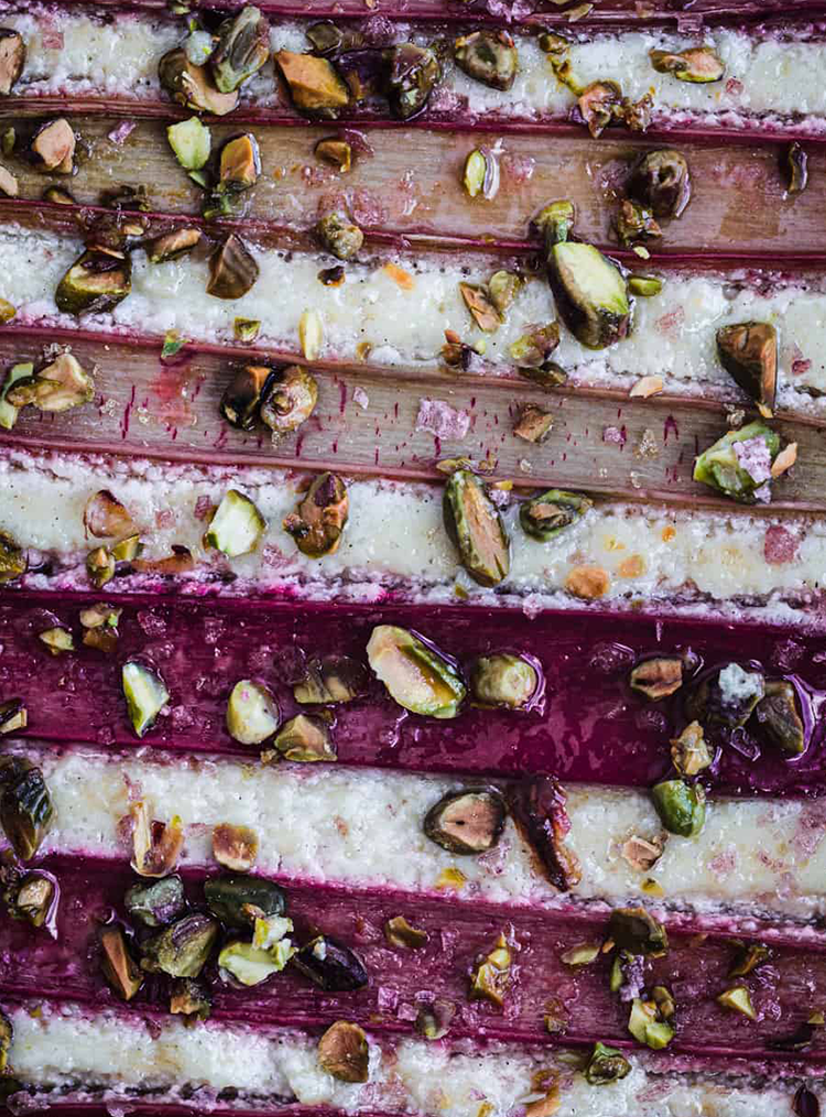 layers of rhubarb and healthy cake with nuts