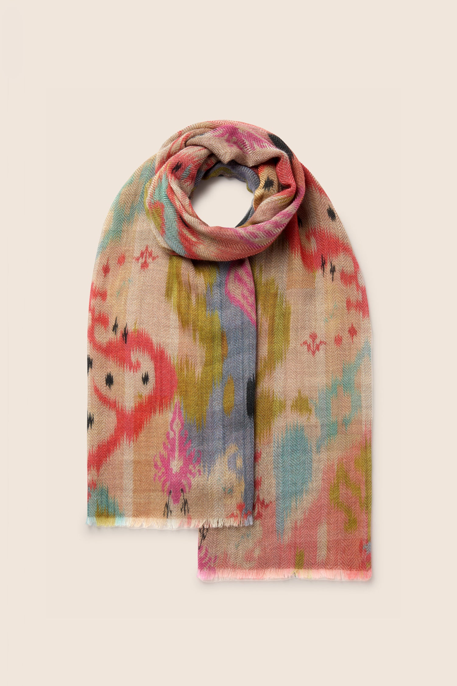 A colorful Decorative Wool Cashmere Blend Scarf with an abstract artistic pattern is neatly folded on a beige background, making it the perfect accessory for all-occasion styling.