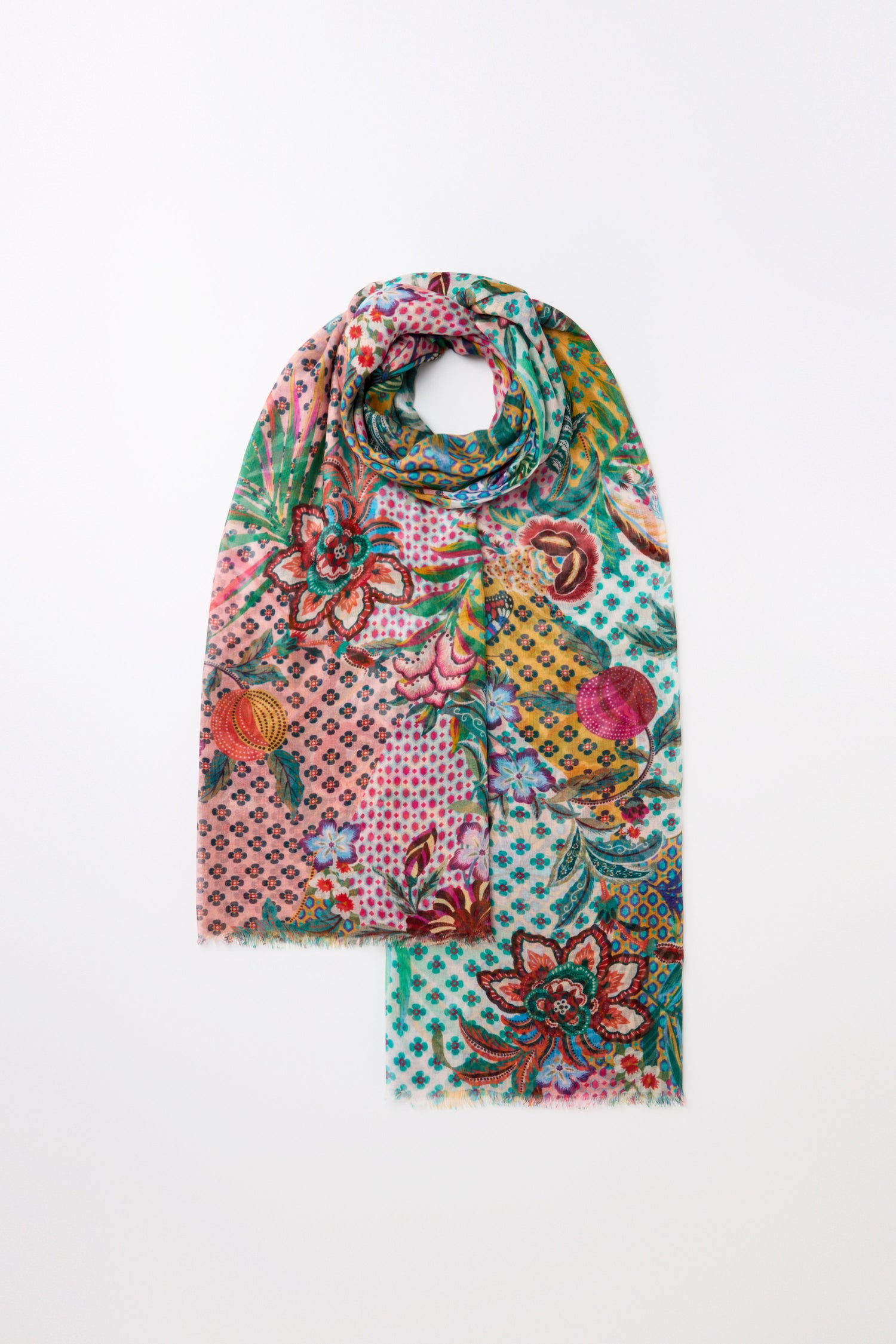 Discover effortless style with the Botanical Patchwork Scarf, a multicolor accessory featuring floral prints and vibrant pink, green, yellow, and blue accents that enhance its intricate dot and flower designs.