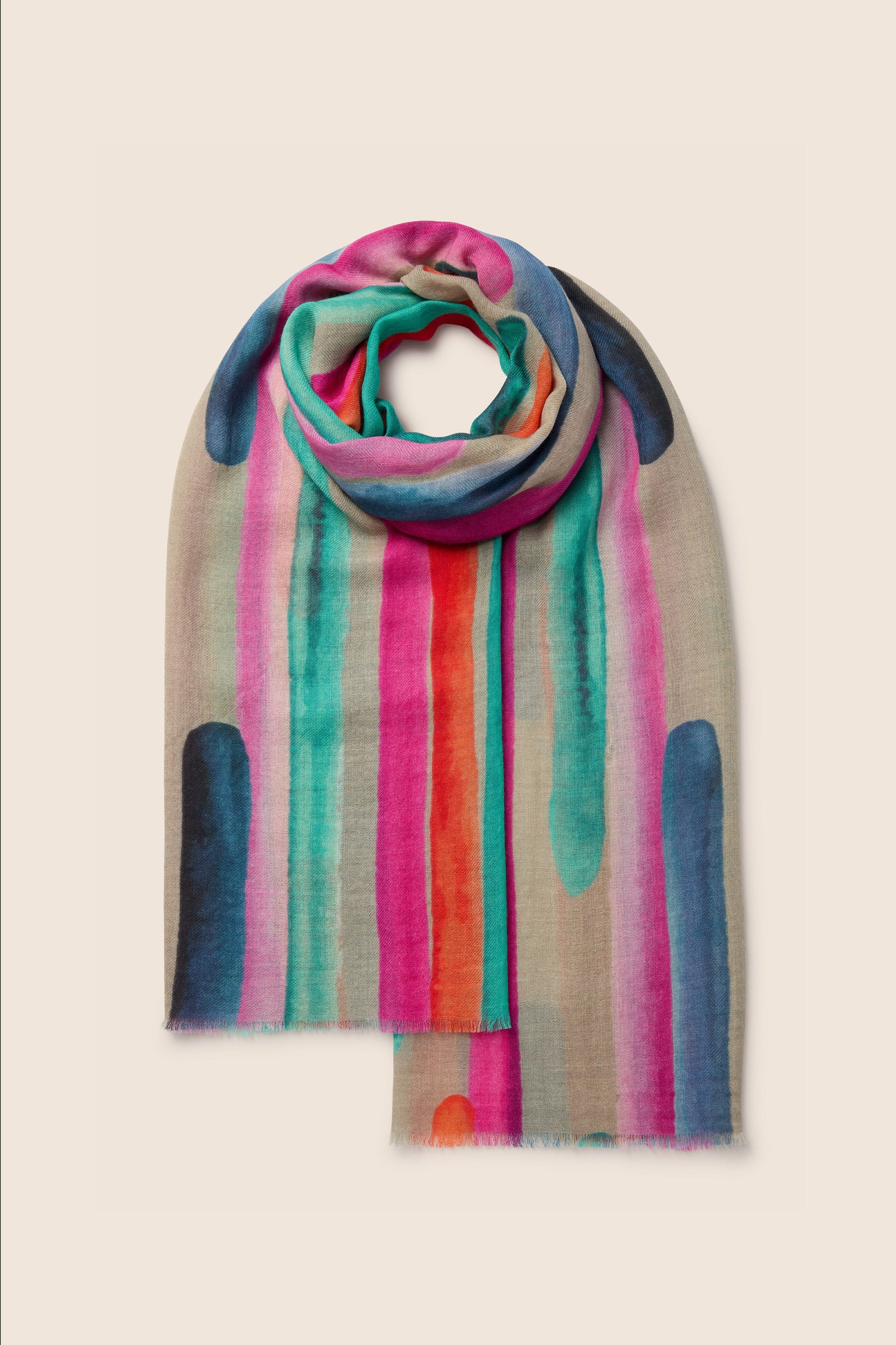 Our Painterly Stripe Wool Mix Scarf boasts vibrant vertical stripes in shades of pink, blue, green, and orange set against a light beige background. Inspired by brushstrokes, this scarf is elegantly folded and perfect for any occasion.
