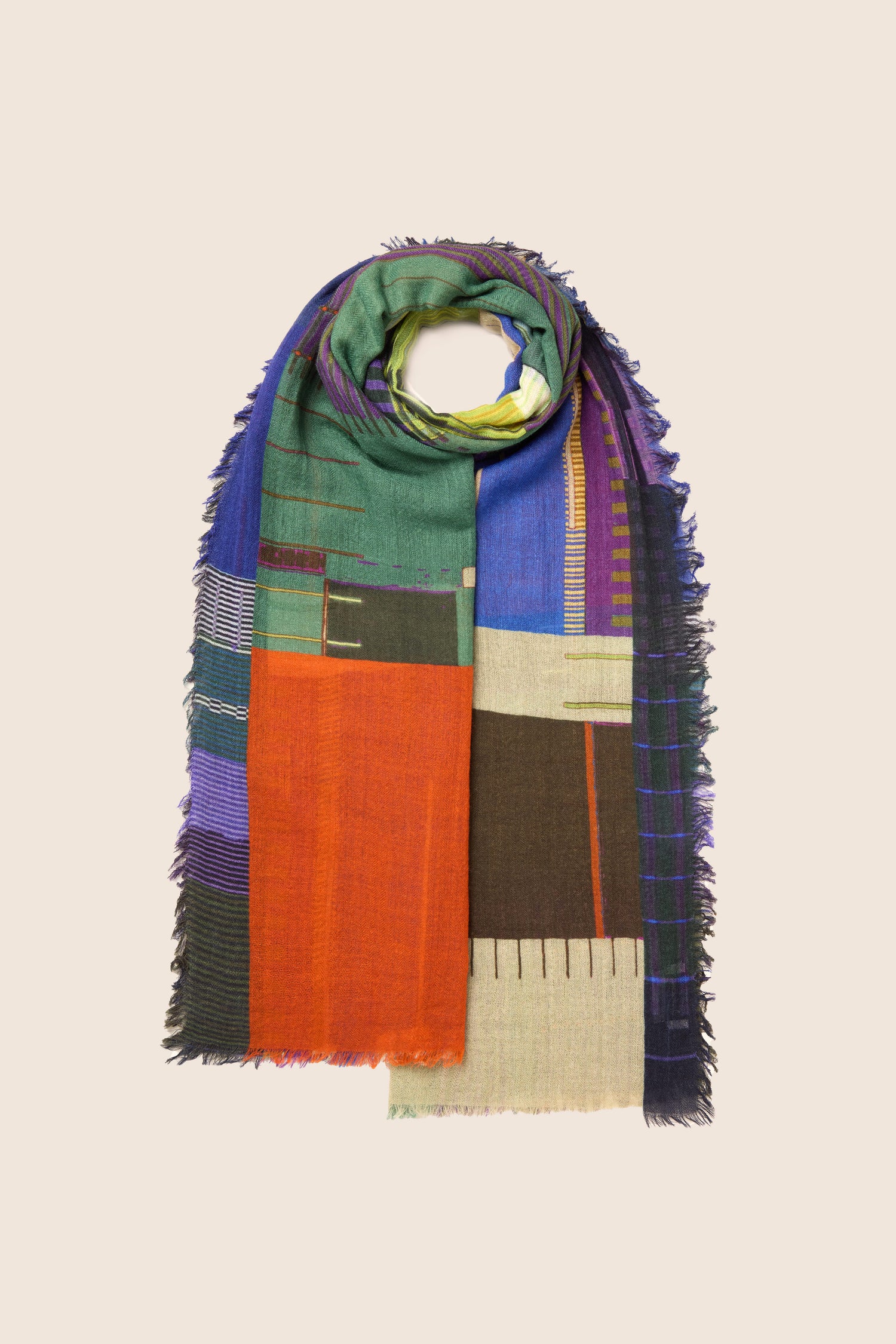 The Digital Print Wool Scarf showcases a vibrant, multicolored plaid pattern with elegant fringe edges, expertly crafted from premium-quality wool.