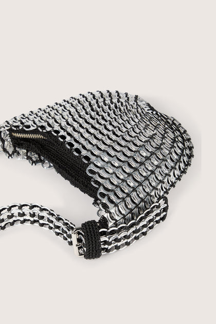 Handcrafted in Brazil, the Bellani Small Bottletop Handbag features a signature chainmail design against a white background.