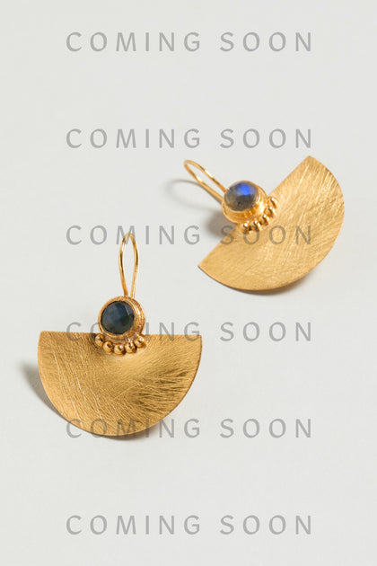 Hand Crafted Gold Labradorite Fan Earrings: Gold half-circle earrings with dark blue labradorite stones and wire hooks, shown on a light background. "COMING SOON" is overlaid multiple times with style EKBPE016-SS26.