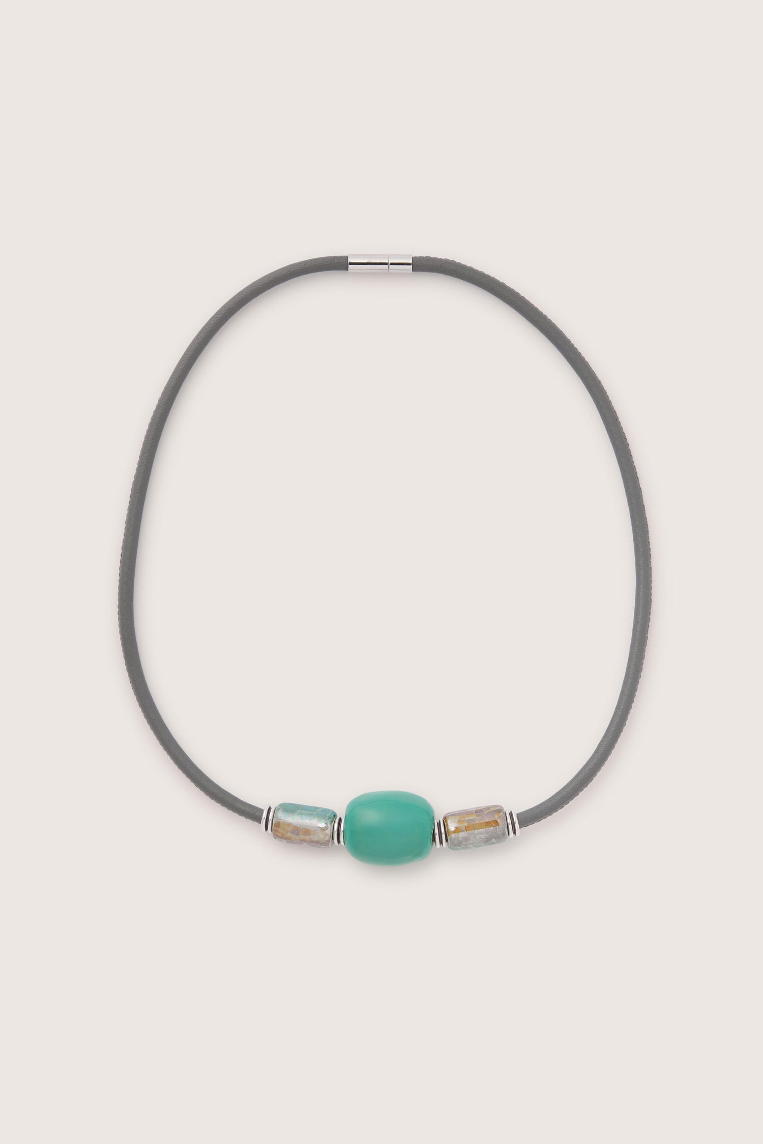 A stylish Triple Bead Leather Cord Necklace from Etnika features a single green central bead flanked by two smaller silver beads, displayed elegantly on a white background.