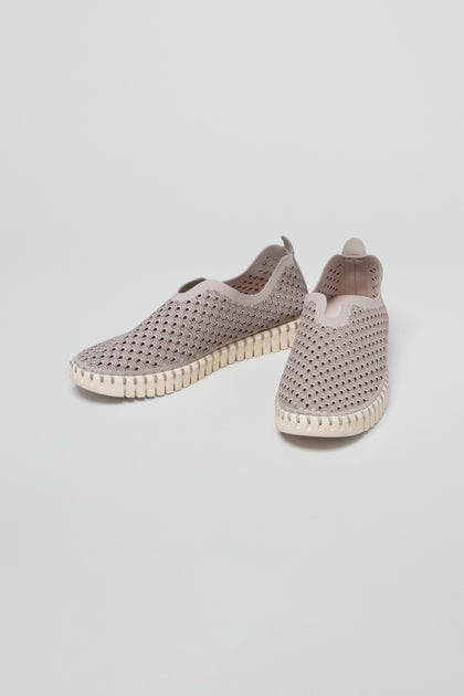Grey Tulip Slip On Shoes featuring perforated uppers and white textured soles, inspired by Scandinavian design, are displayed on a plain white background.