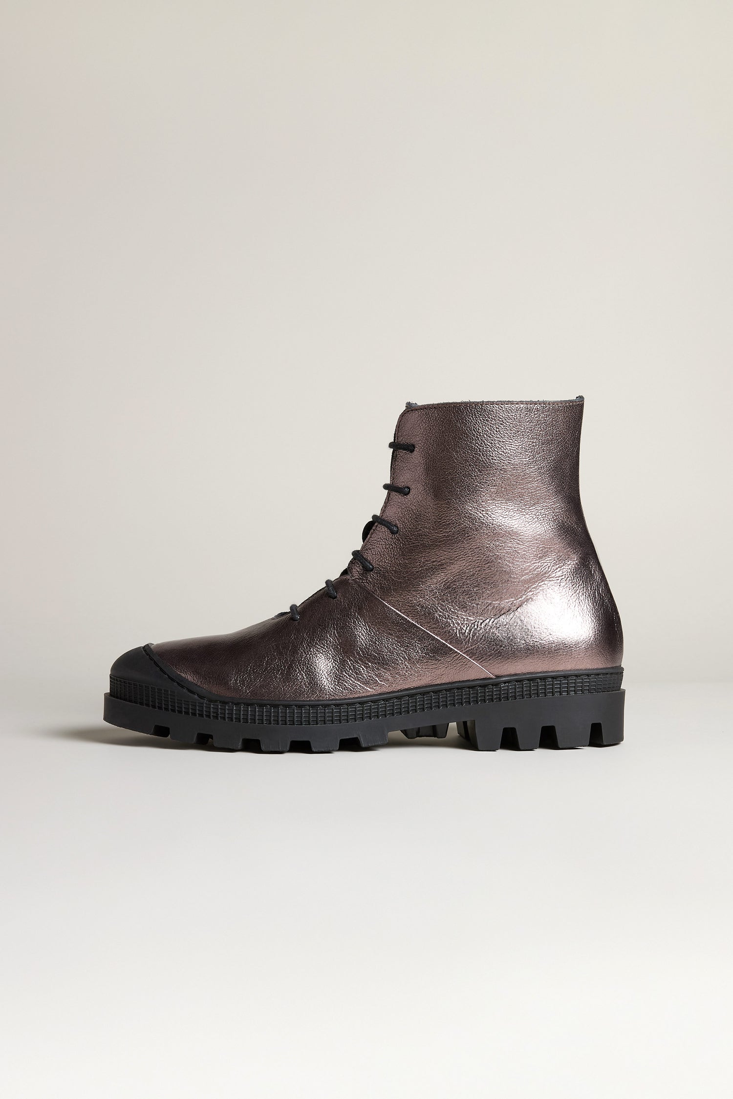 The Rose Metallic Lace Up Leather Boots feature high-grade leather, a thick black rubber sole, and chunky tread, shown against a plain light background.