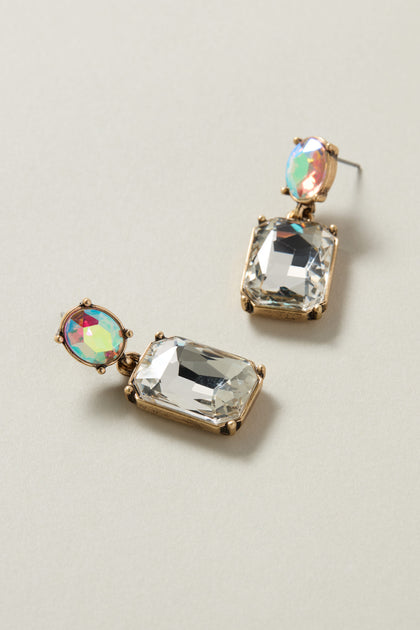 Crystal Gemstone Earrings featuring a rectangular clear crystal and an iridescent oval stone, elegantly set in a gold-tone frame.