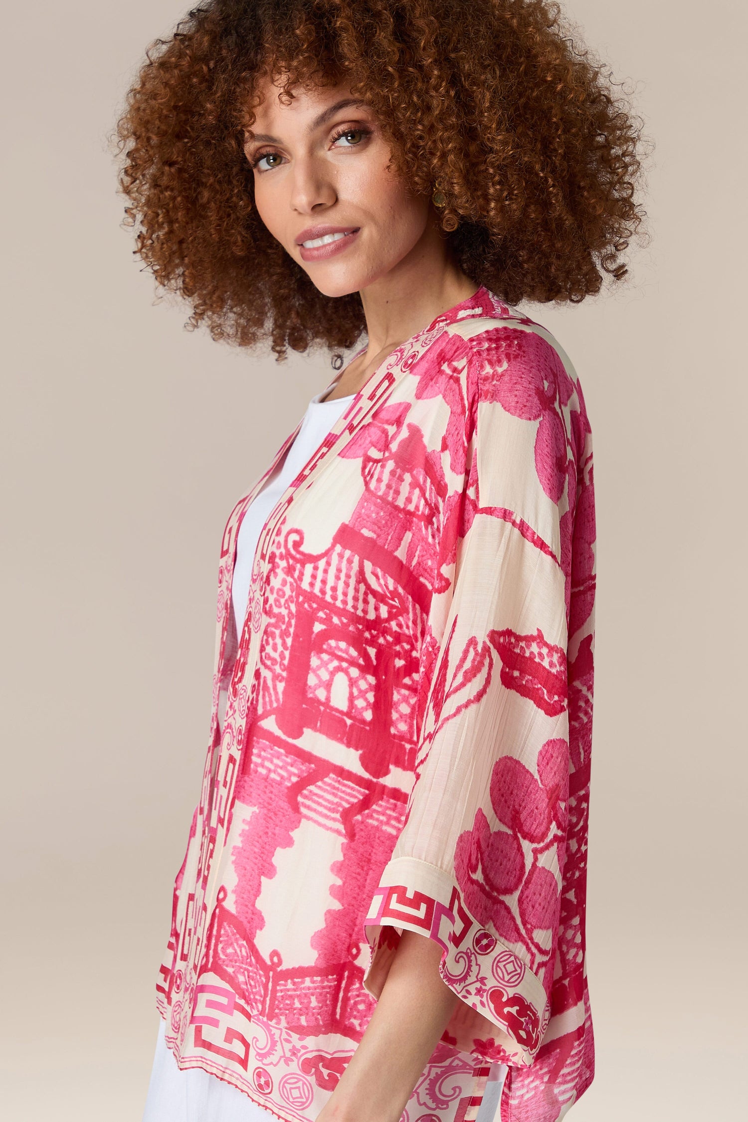 A woman in a Willow Kimono with willow print.