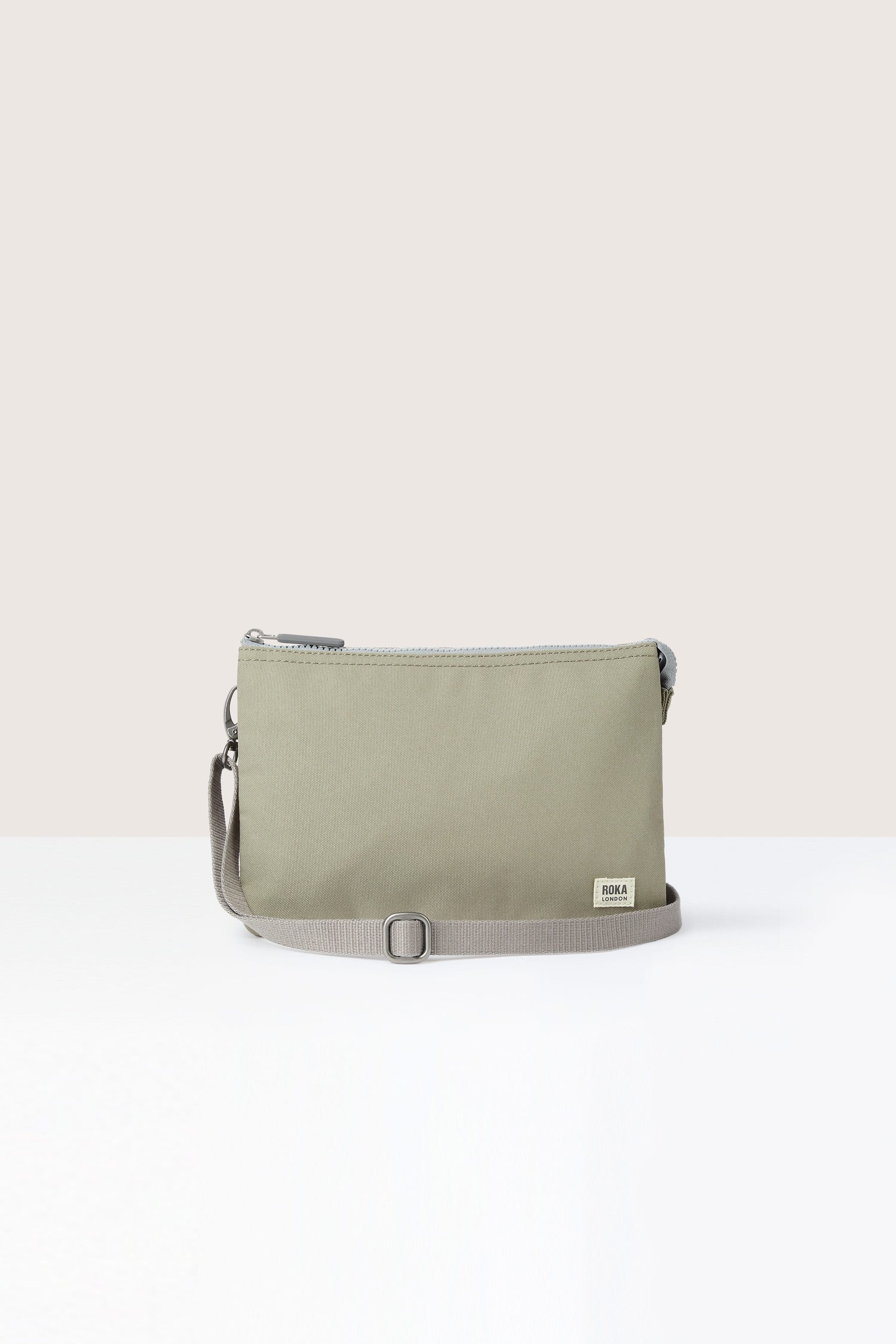 This Recycled Carnaby Crossbody Bag is lightweight and weather-resistant.