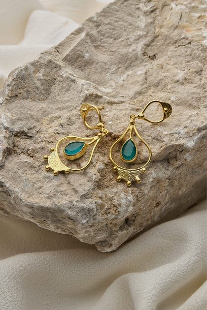 Handcrafted Teardrop Earrings featuring turquoise stones.